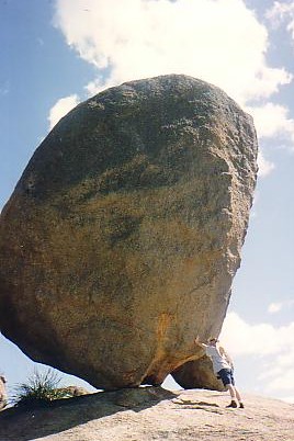 Holding up this huge rock in Girrahween National Park in southern Queensland