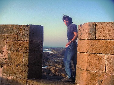 Mike, getting blown away on the ramparts in Essouira.
